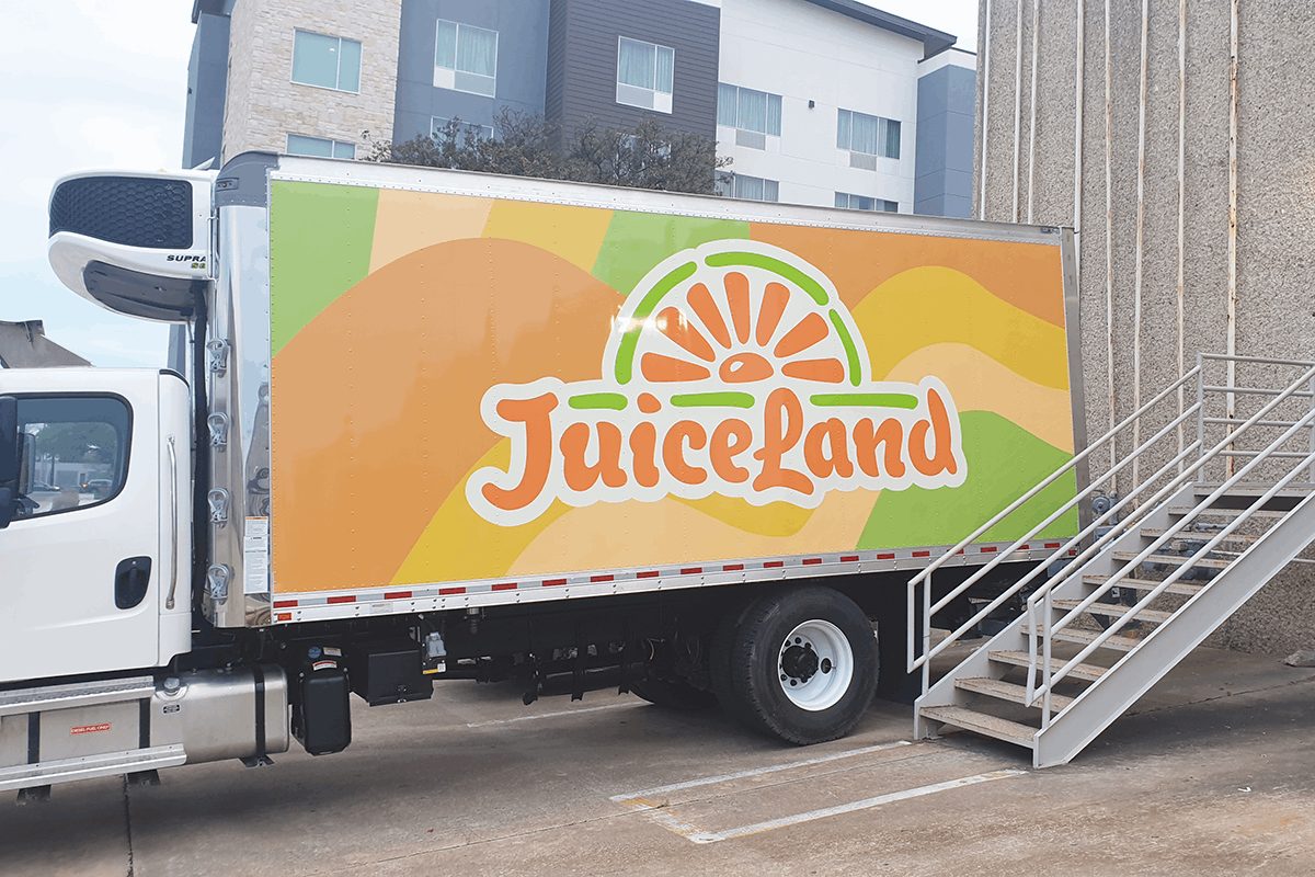 Branded truck vinyl graphics for a food and beverage company.