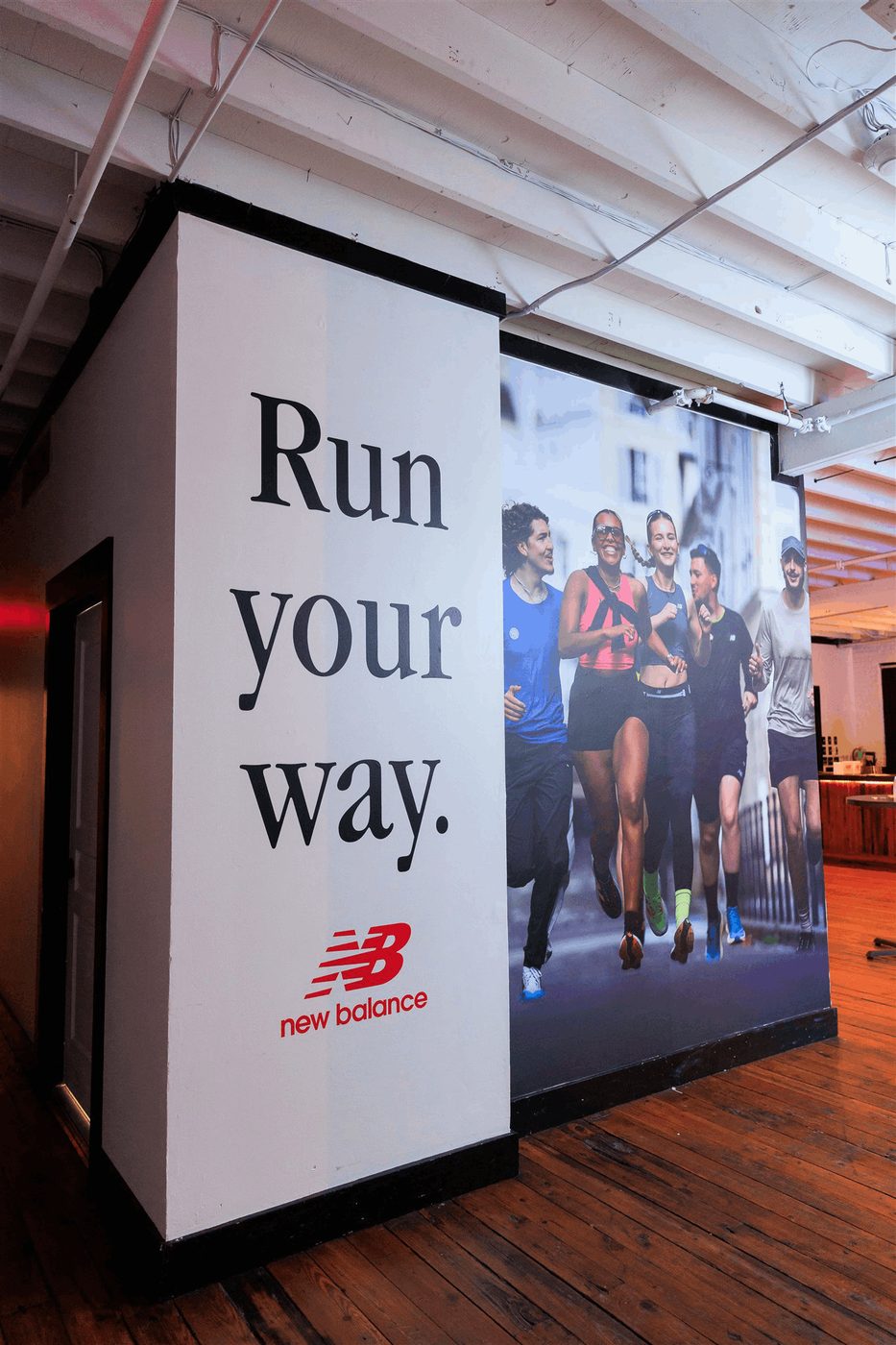 Large event wall graphics installed inside a venue.