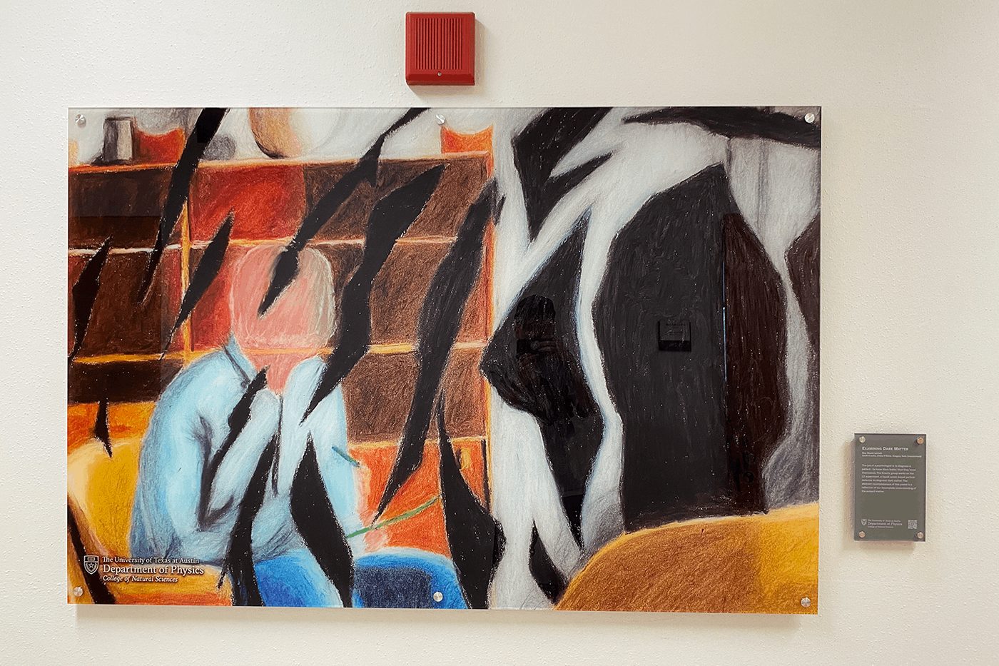 Mounted acrylic wall display with printed artwork.