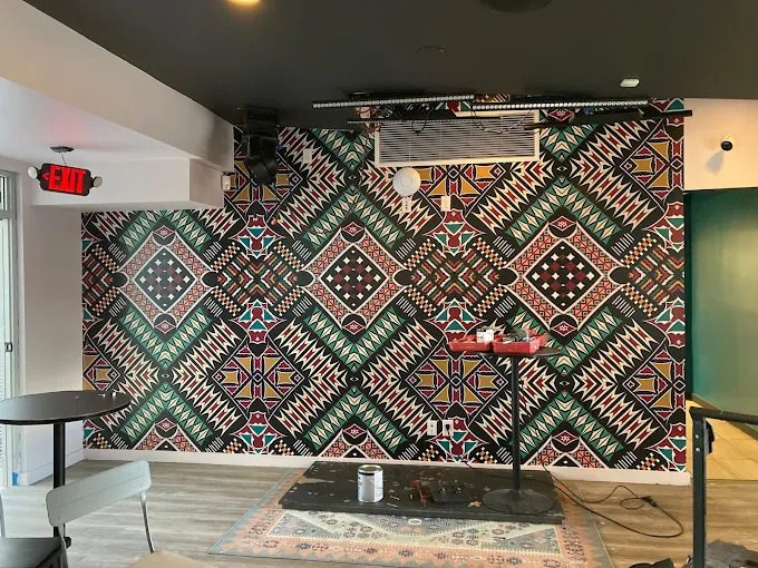 Patterned event wall wrap installed inside a venue.
